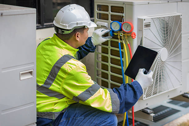 Professional Air Duct Cleaning technician working in Wantagh, NY